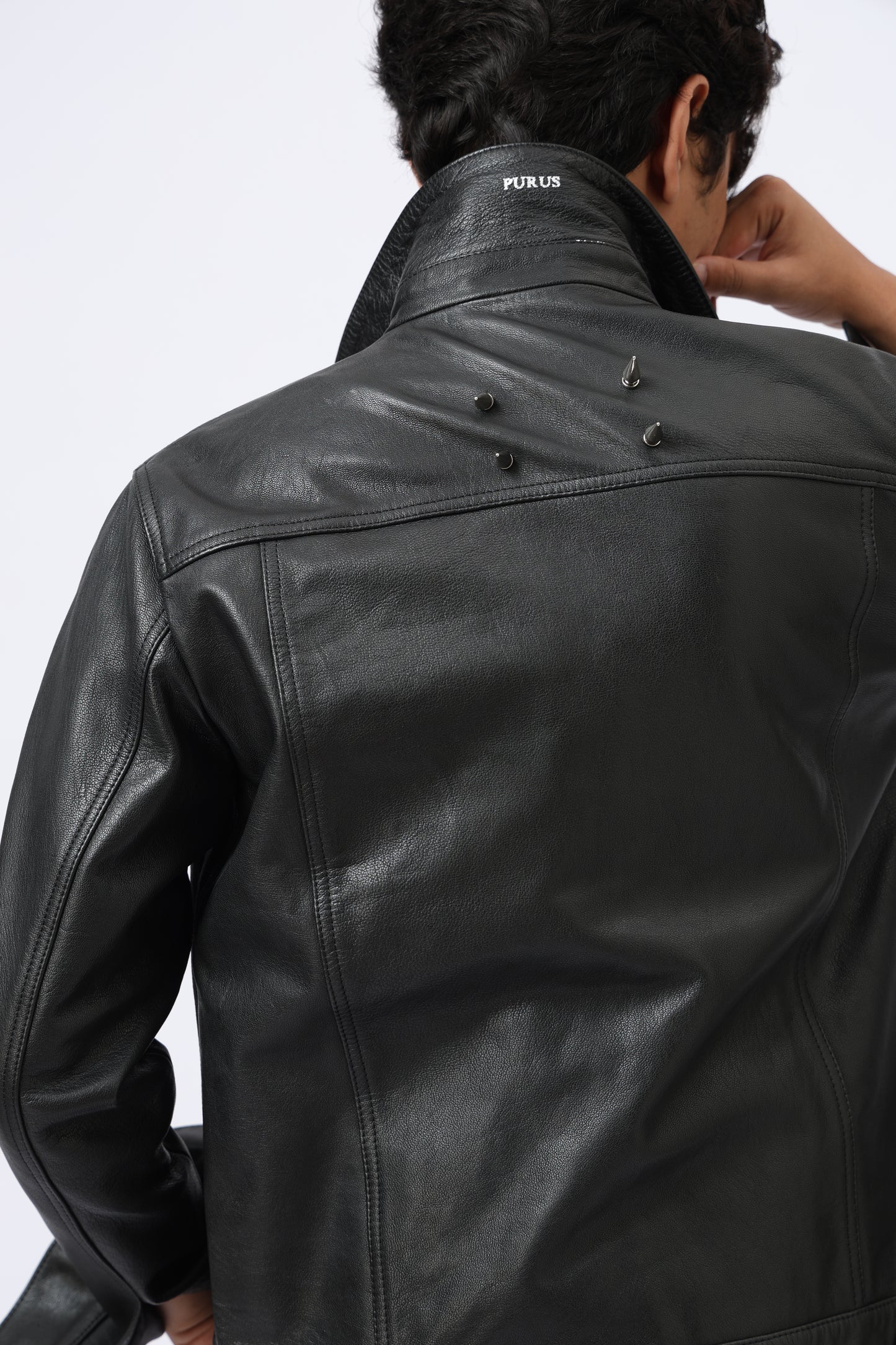 Raw black leather jacket