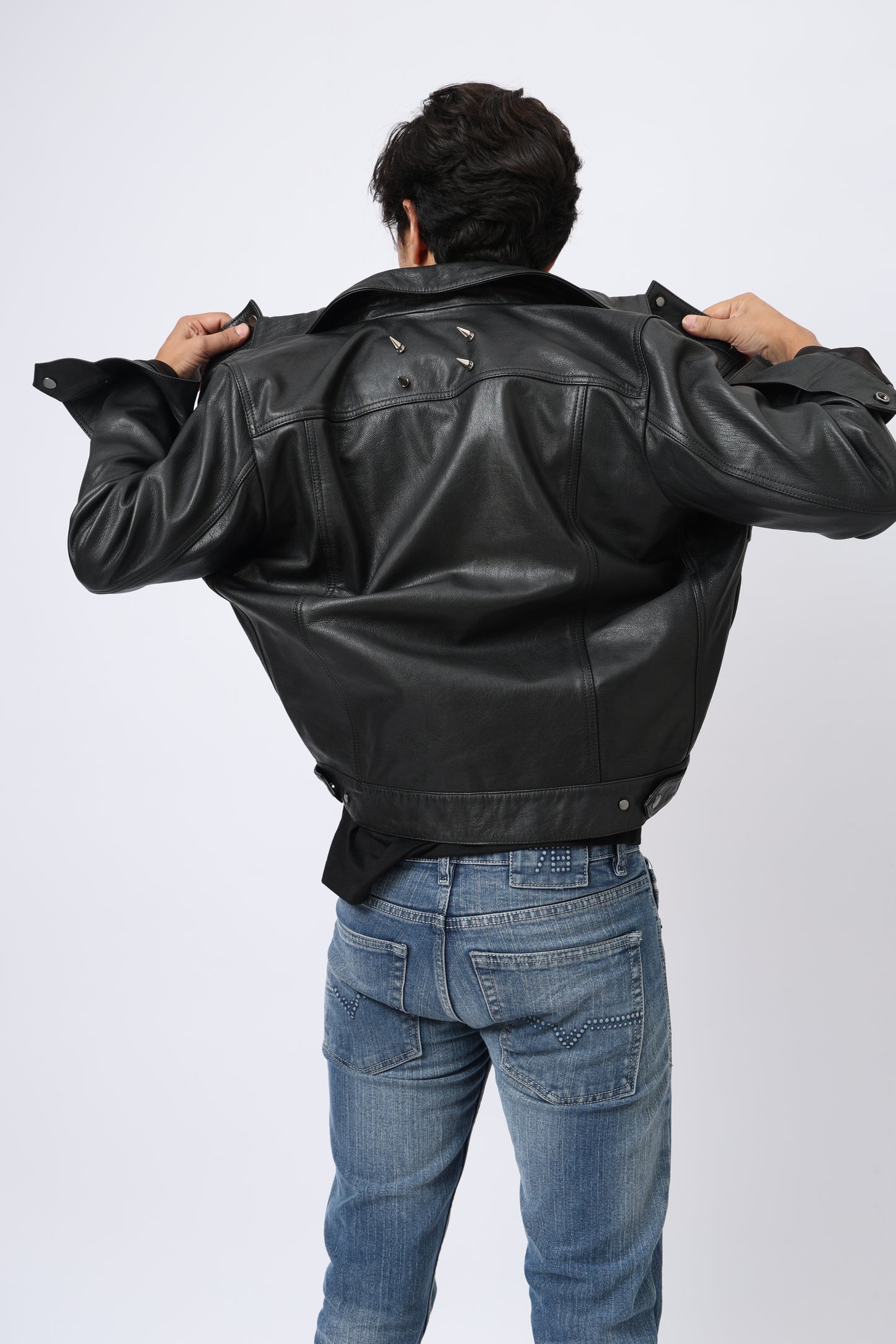 Raw black leather jacket